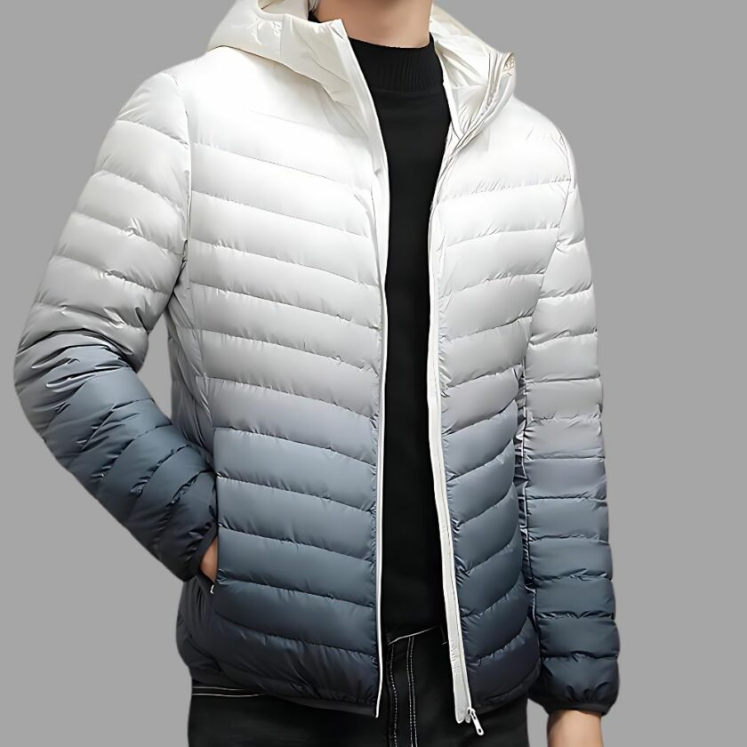 Une doudoune dégradée blanc et gris ultra légère homme portée avec une main dans la poche droite